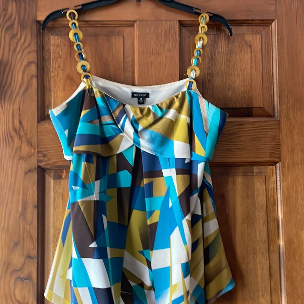 Brown and blue top
